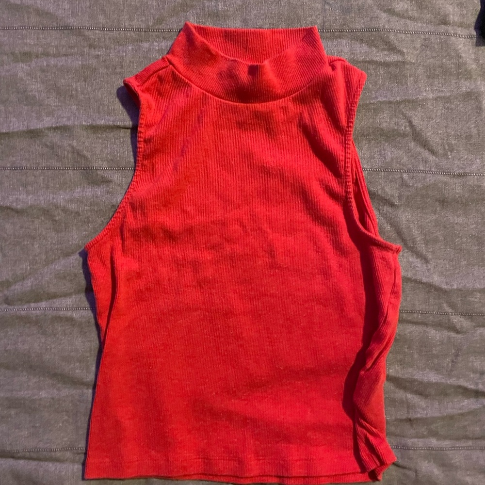 Red turtleneck sleeveless
